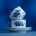 Stacked ribbon bird porcelain coffee cups