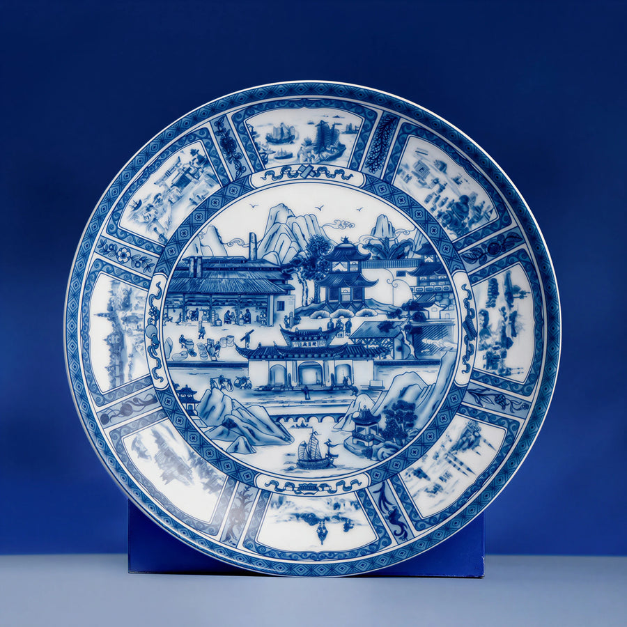 Jingdezhen Silk Road porcelain plate displayed upright on a blue stand