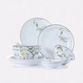 Complete Spring Dawn eleven-piece Jingdezhen porcelain dinnerware set with green botanical decoration and silver-colored rims on a white background.