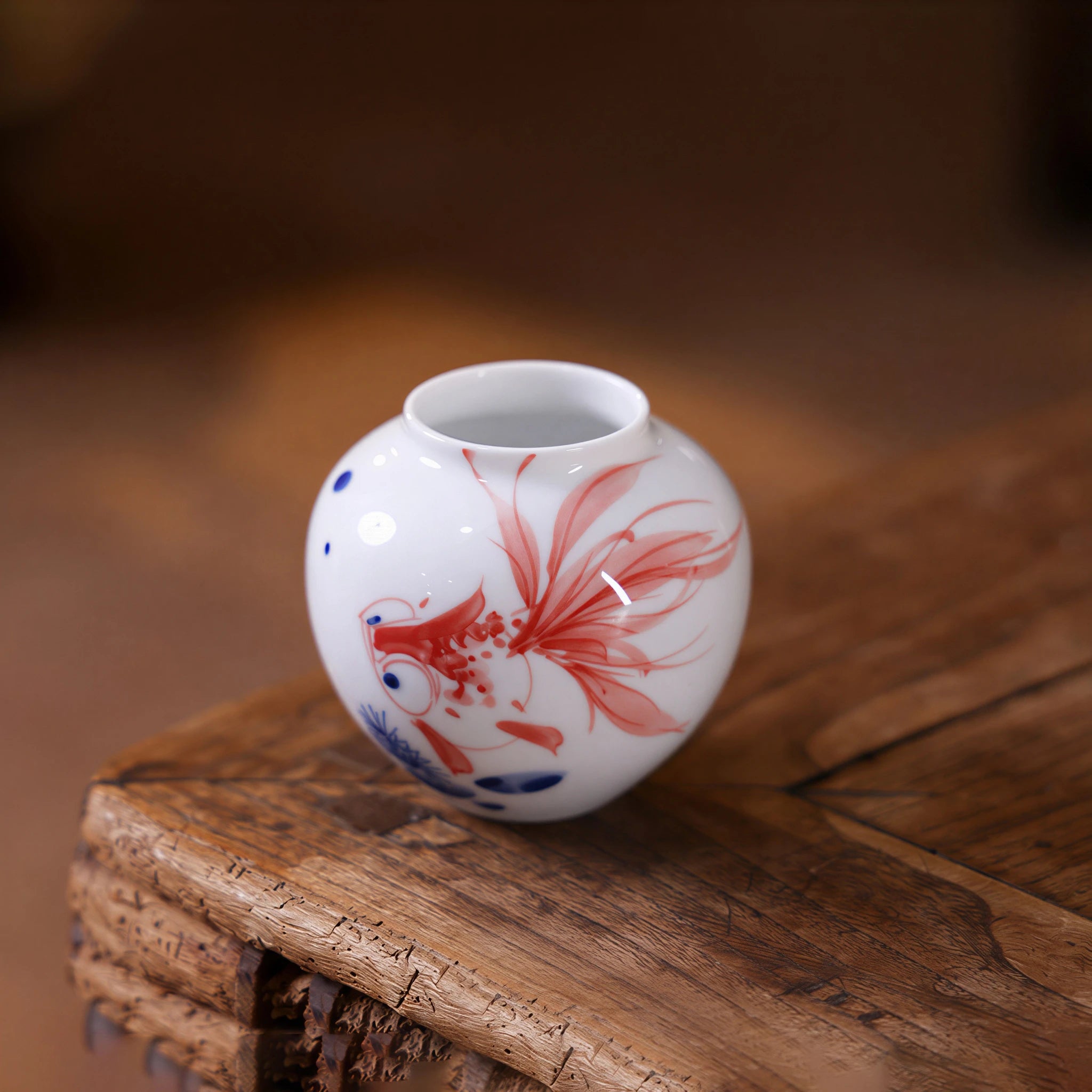 Wide-mouth goldfish porcelain vase with glossy white glaze
