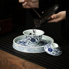 Wood-fired lotus gaiwan placed on the ceramic tea stage