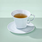 Jingdezhen Yingqing porcelain coffee cup with carved peony relief
