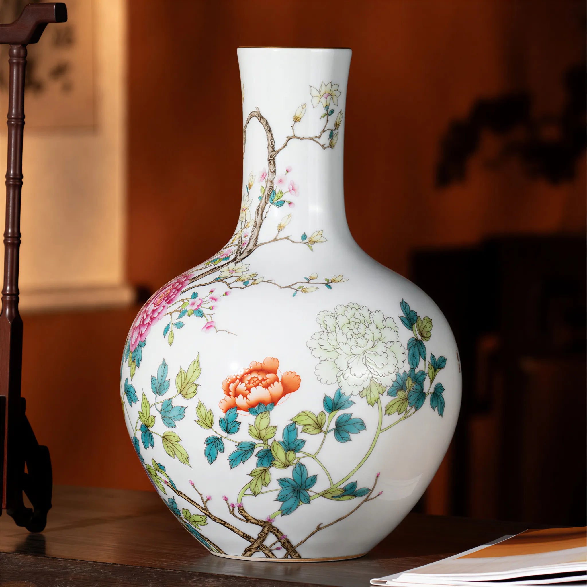 Angled view of the magnolia, crabapple, and peony Tianqiu vase
