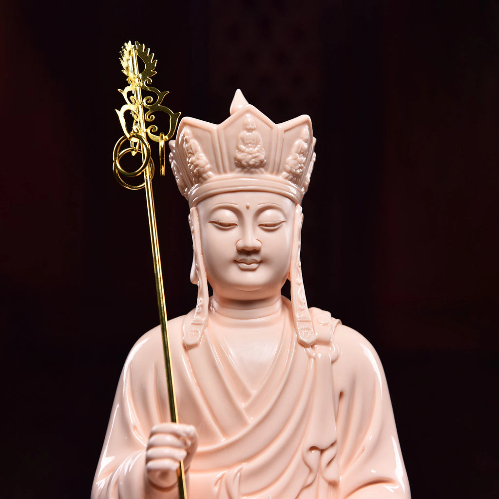 Close view of Ksitigarbha with monk's staff and flaming jewel