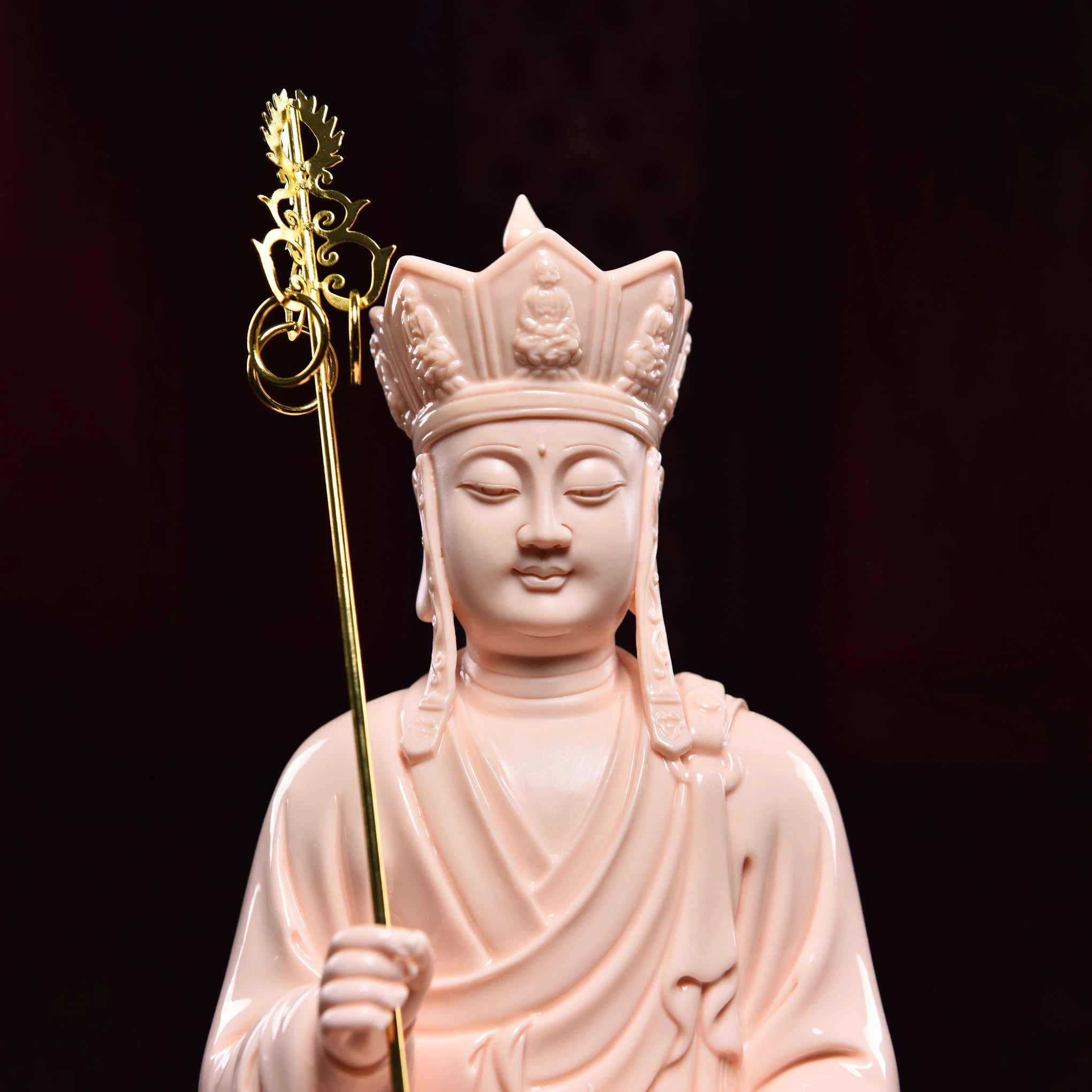 Close view of Ksitigarbha with monk's staff and flaming jewel