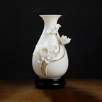 Large white porcelain lotus relief vase shown in full profile