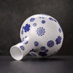 Side profile of the Tianqiu vase showing its rounded body and straight cylindrical neck