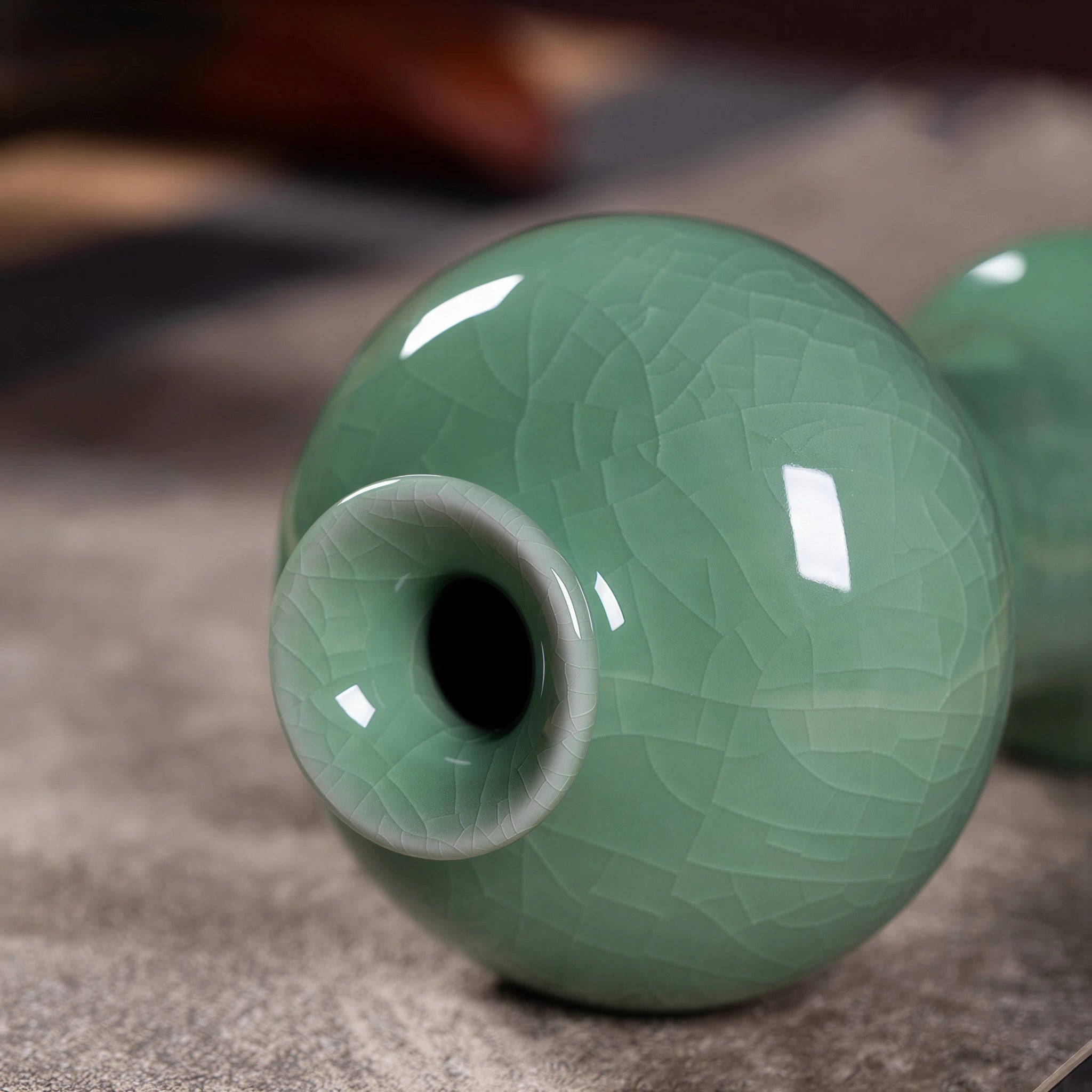 Flared rim detail on the Longquan celadon bud vase
