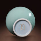 Base and mark of the contemporary Longquan celadon Meiping vase