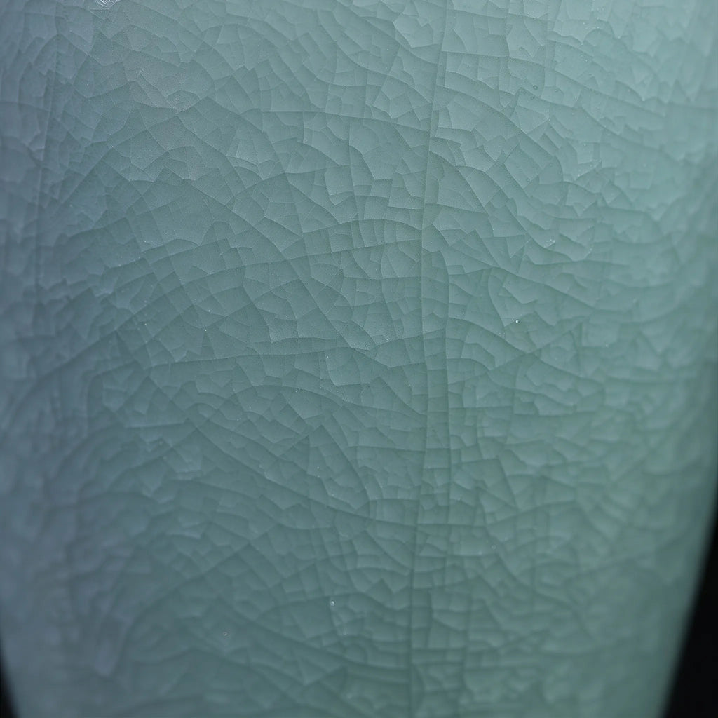 Fine crackle network in the pale Longquan celadon glaze