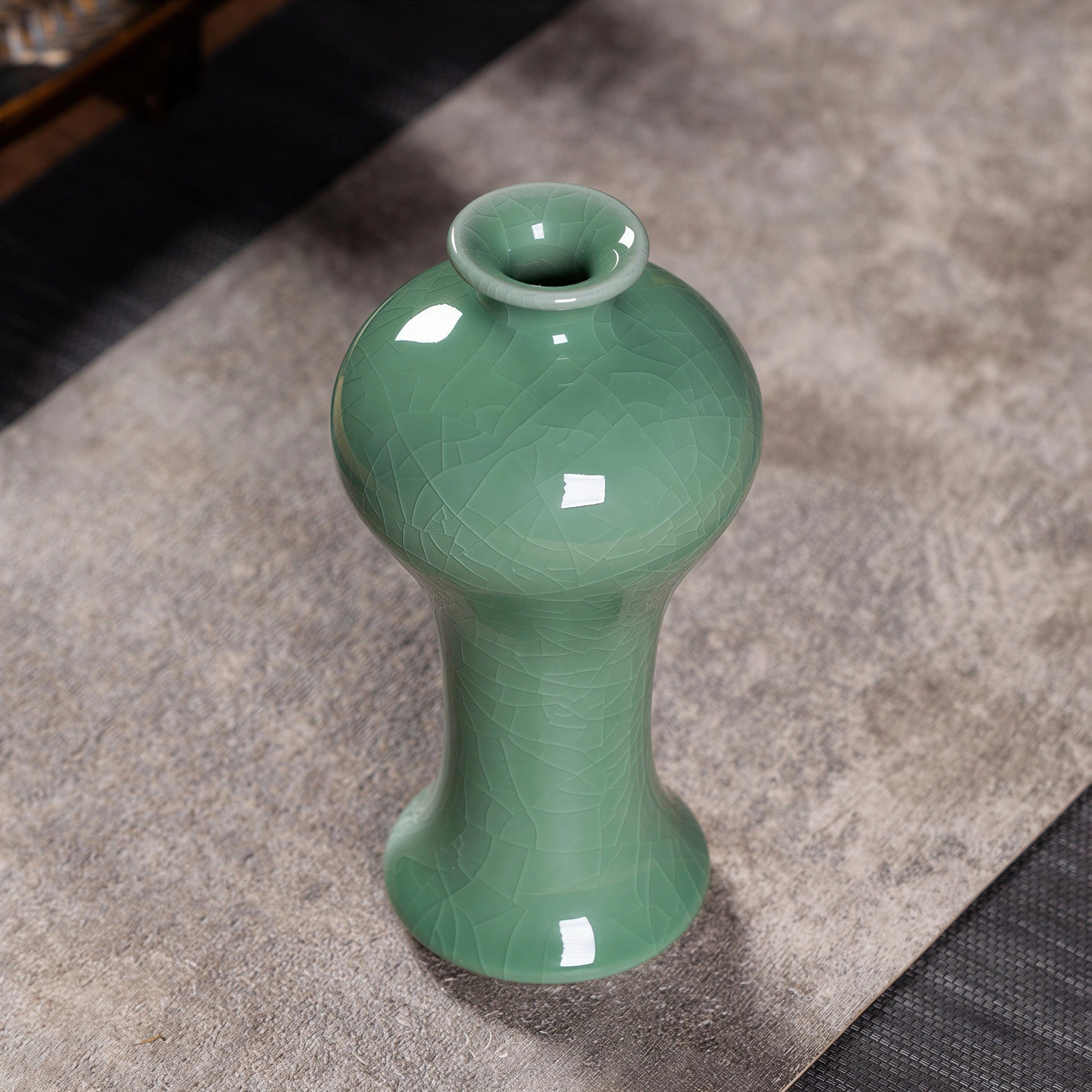 Top angle showing the flared rim and slender neck
