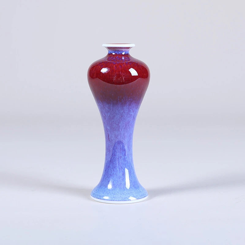 Slender rose-purple Meiping mini porcelain vase with a blue lower body.