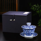 Blue-and-white millefleurs gaiwan in its presentation box