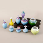 Collection of miniature Jingdezhen reactive glaze porcelain vases in blue and mixed colors