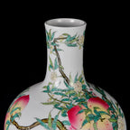 Painted branches and leaves rising across the Tianqiu vase neck