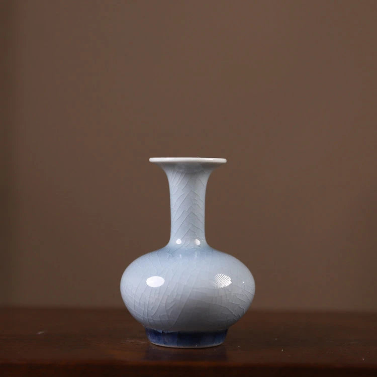 Front view of a pale-blue Shangping porcelain vase with crackle glaze