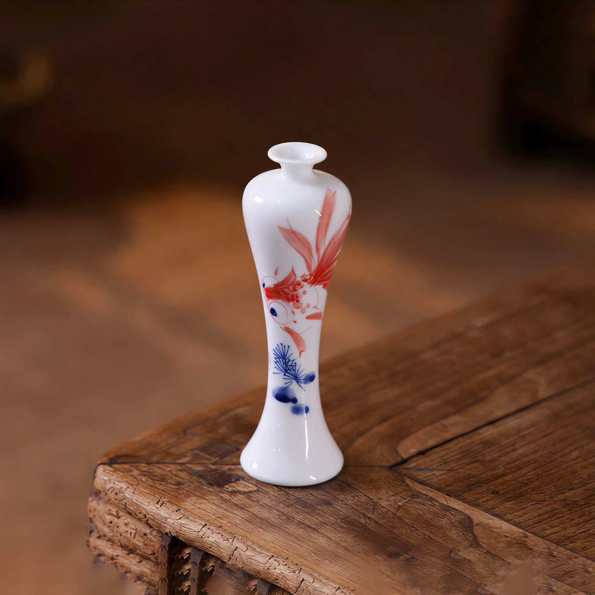 Slim white Meiren vase with hand-painted red goldfish and blue foliage