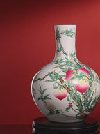Qianlong Famille Rose Nine-Peach Tianqiu Vase