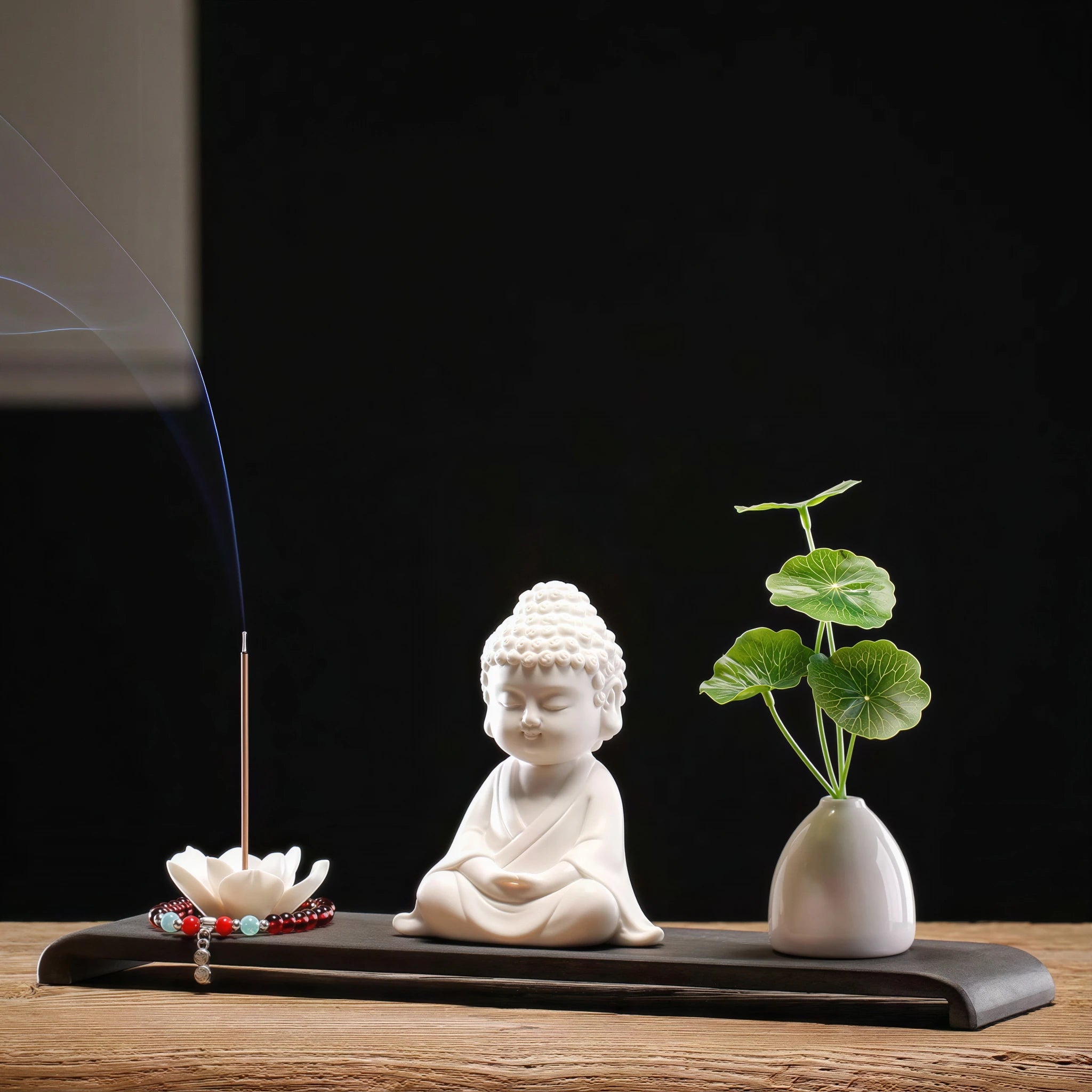 Angled view of the seated Buddha, lotus holder and vase