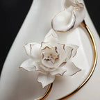 Close view of the raised lotus petals, stem, and gold-toned outlines