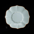 Overhead view of the scalloped Ru-style celadon saucer