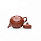 Angled view into the open Shui Ping Yixing teapot