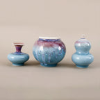 Small blue yaobian porcelain vases grouped by rounded and narrow-mouth forms