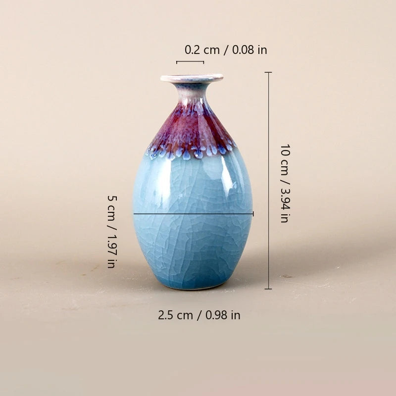 Teardrop reactive-glaze vase size guide showing 5 cm width, 10 cm height, 0.2 cm mouth, and 2.5 cm base