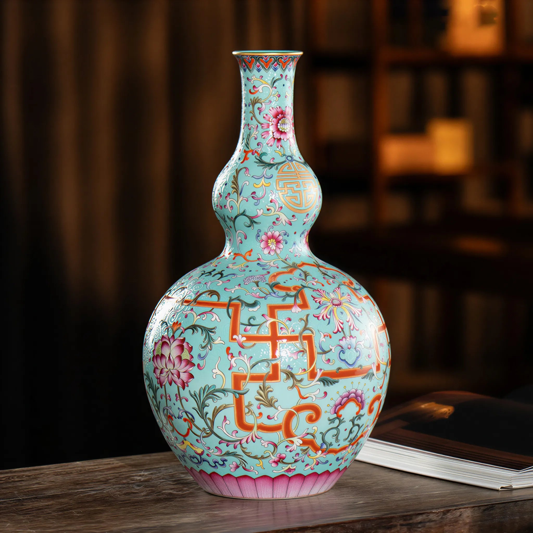 Continuous famille rose floral pattern across both gourd sections