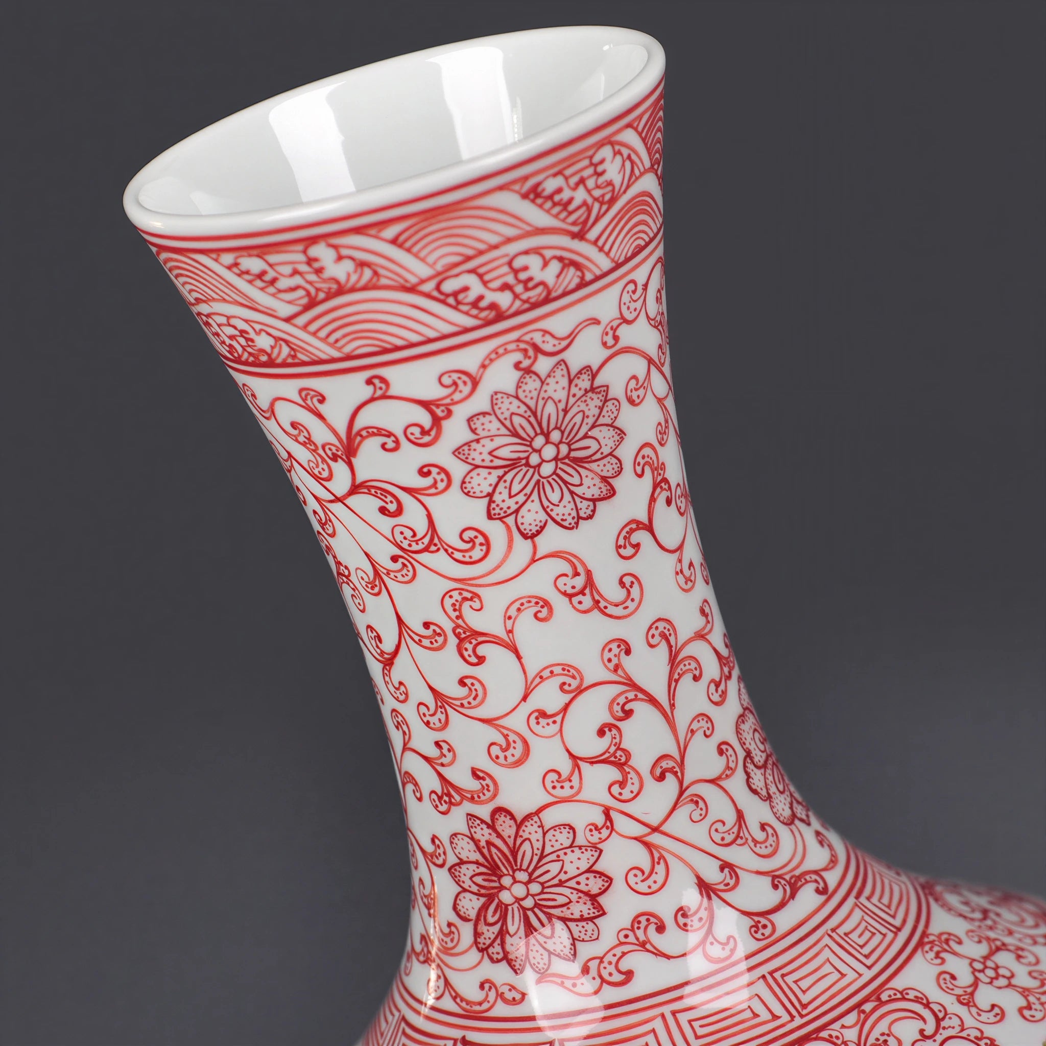 Red border decoration around the tall flared neck