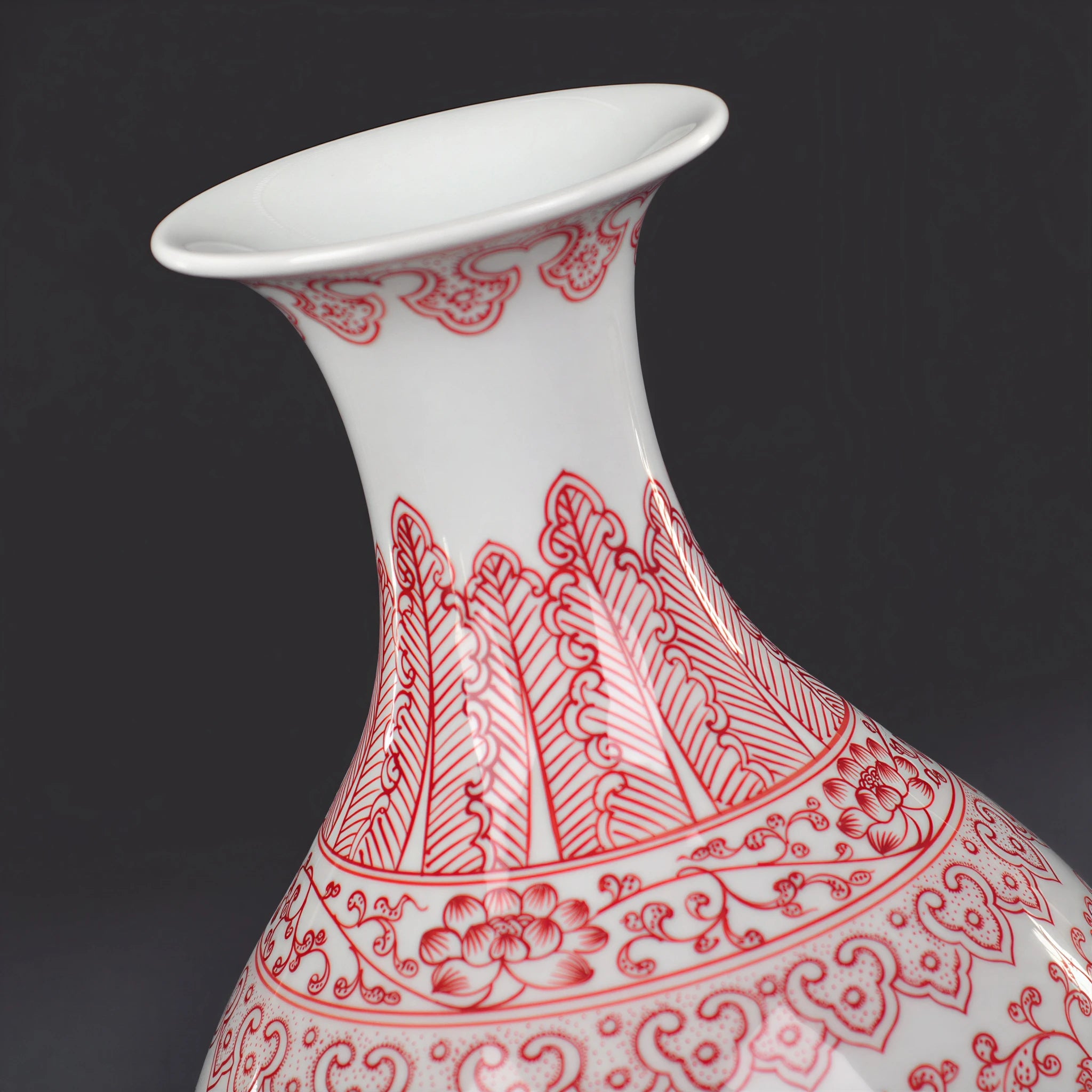 Close view of the flared rim and red neck decoration