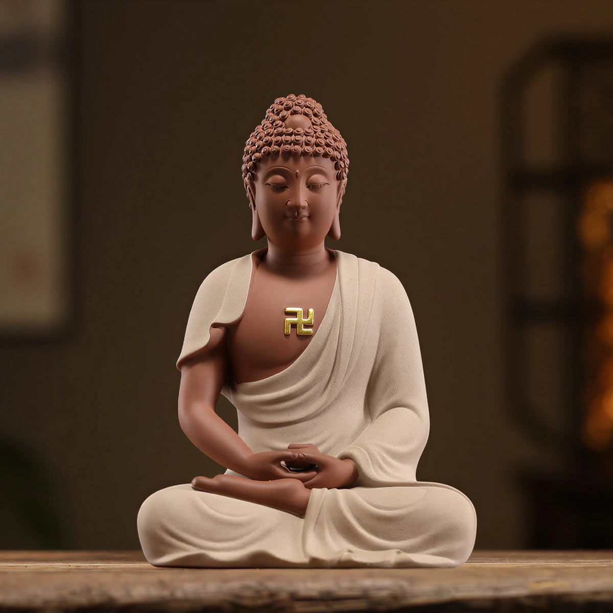 Warm gray textured Amitabha Buddha sculpture in a seated meditation pose
