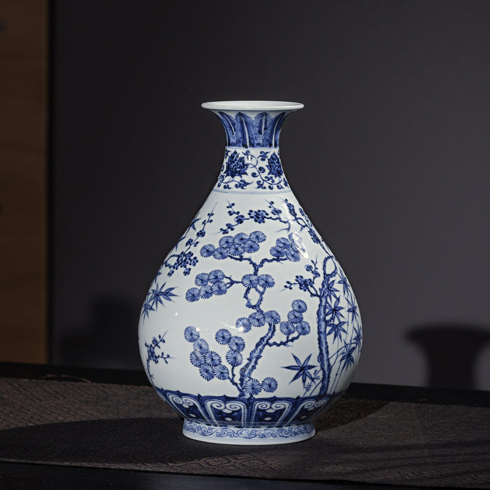 Display view of a Xuande-style blue-and-white Yuhuchun vase on a dark tabletop
