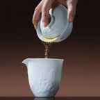 Flared rim and carved relief on the Yingqing gaiwan