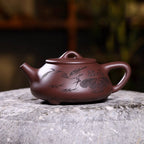 Yixing zini Shipiao teapot with hand-carved lotus
