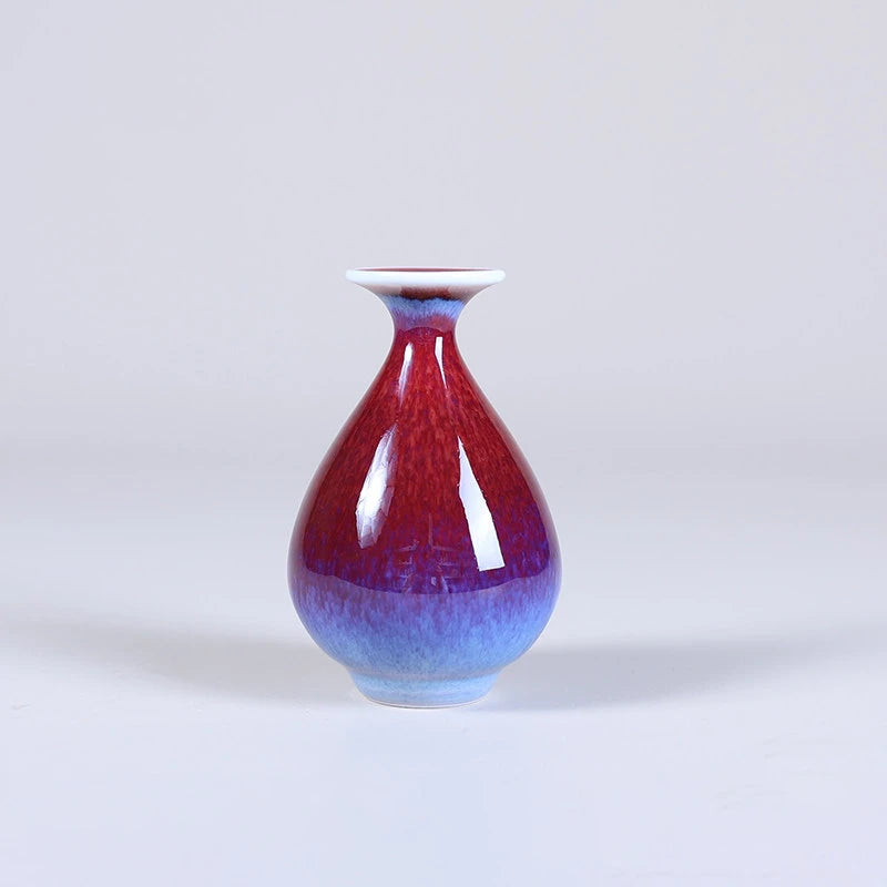 Pear-shaped Yuhuchun mini porcelain vase with rose-purple and blue gradient glaze.
