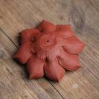 Underside of the unglazed Zhuni botanical incense holder