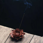 Incense being lit in the center of the Zhuni lotus