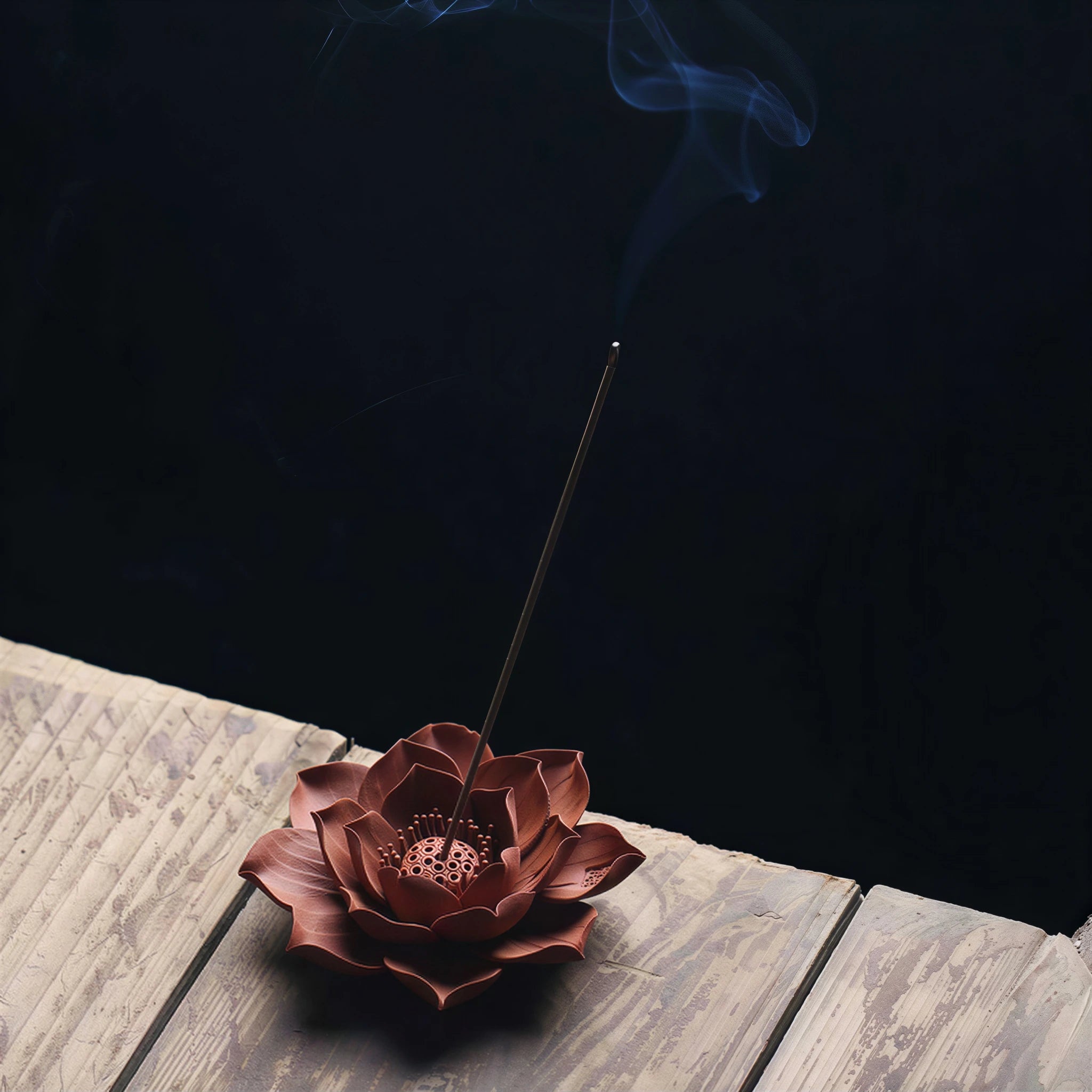 Incense being lit in the center of the Zhuni lotus